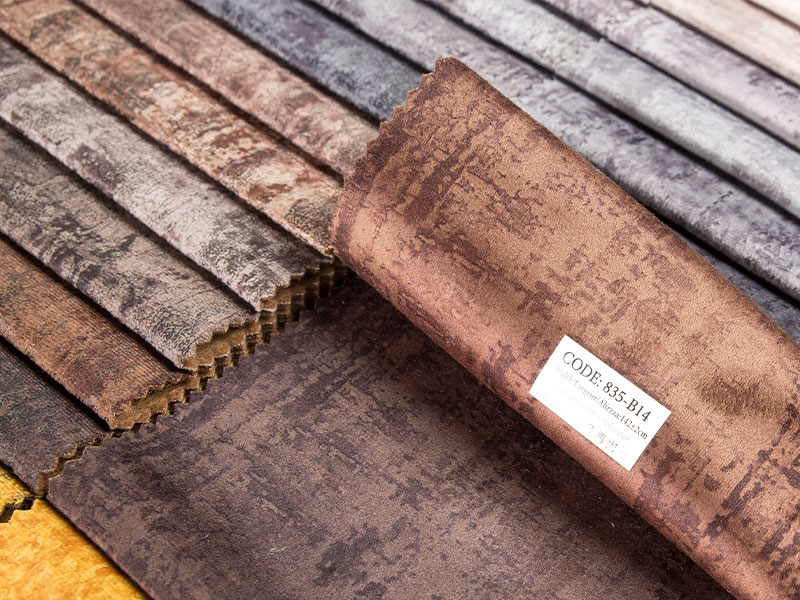Fabraic veilbhit lannaithe ardcháilíochta, foirfe do upholstery agus decor baile